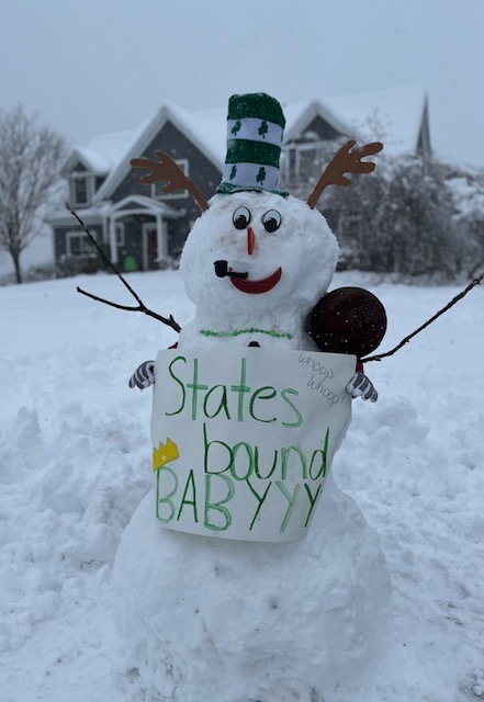 snow man with sign